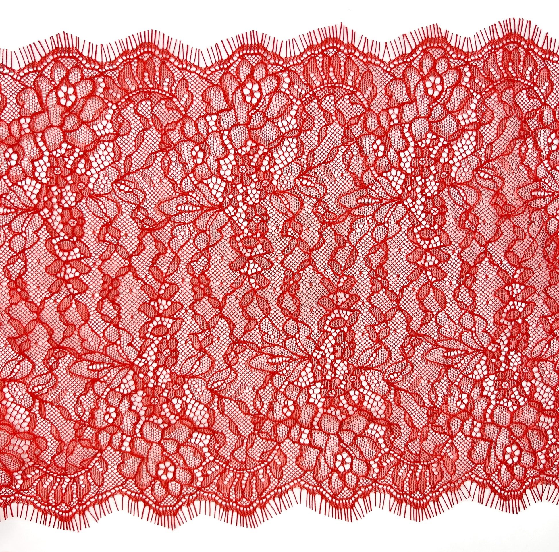 Red Chantilly lace, 22 cm wide, featuring a detailed floral design, perfect for lingerie sewing, decorative accents, and DIY craft projects
