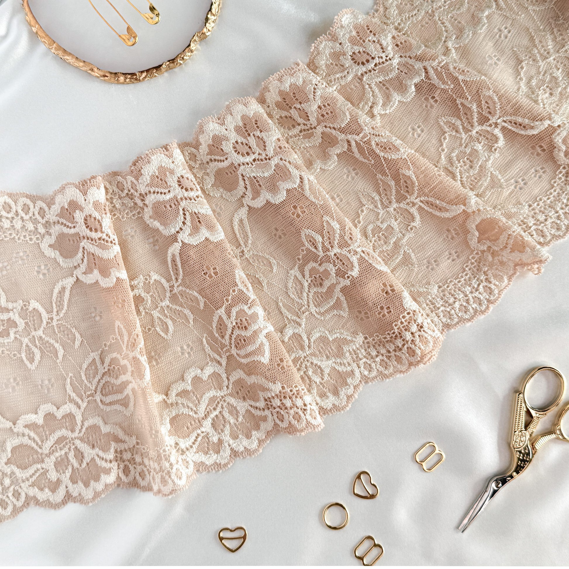 Cold beige elastic lace, 16 cm wide, featuring a delicate floral design, perfect for lingerie sewing, garment accents, and bridal projects.