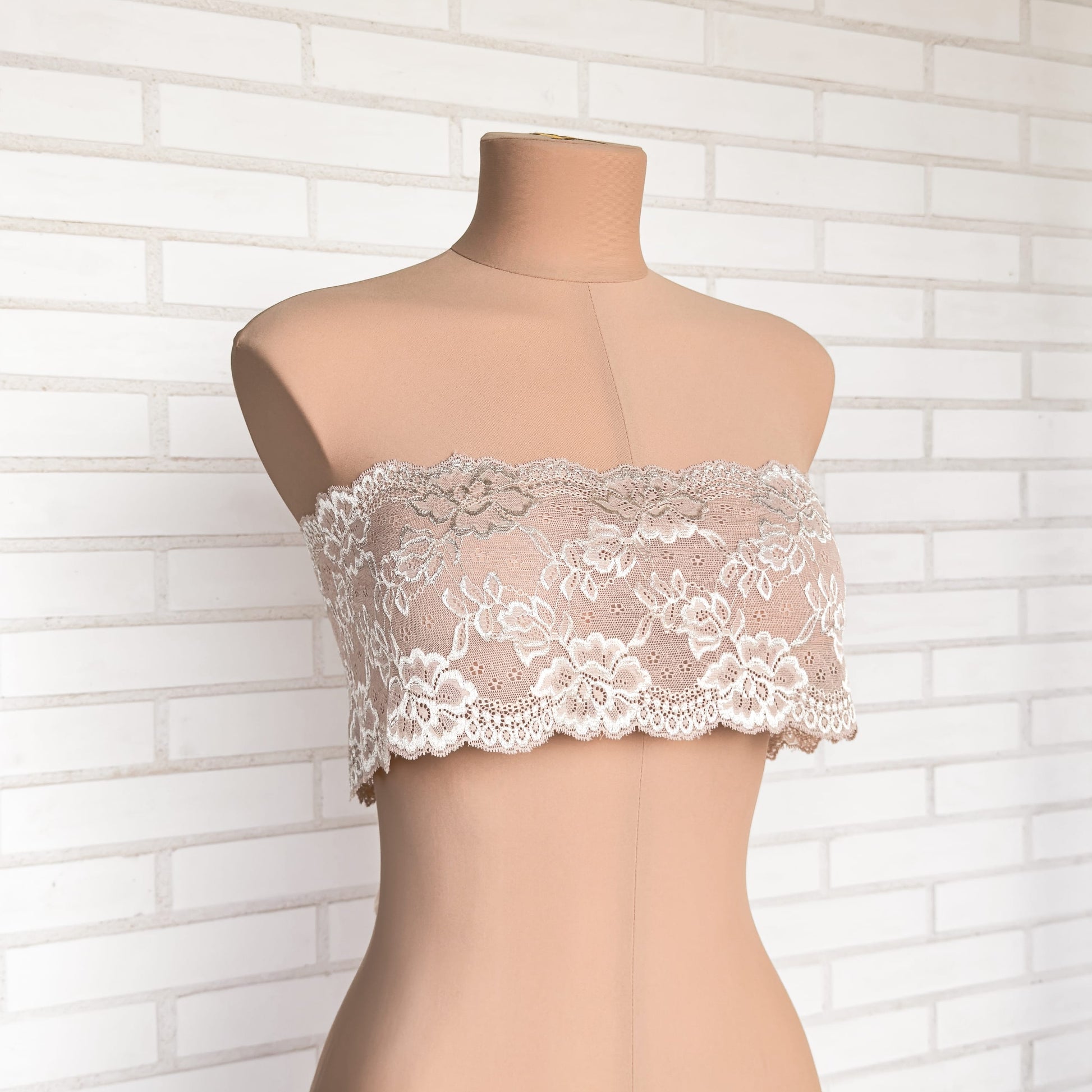 16 cm wide cold beige elastic lace styled on a mannequin, showcasing its versatility for lingerie and creative sewing projects